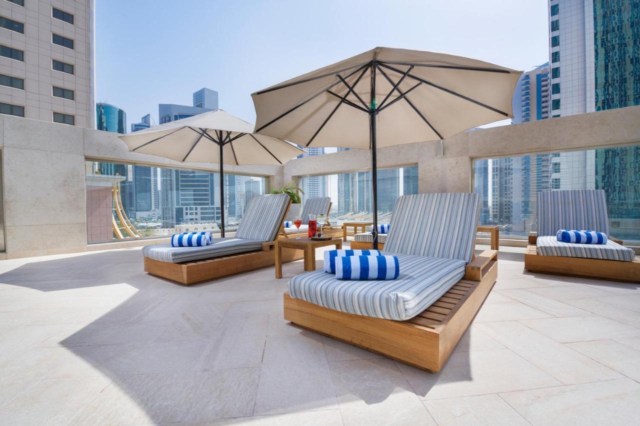 Wyndham Grand Doha West Bay Beach 외부 사진 The pool deck at the hotel
