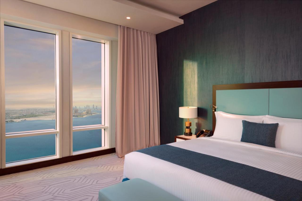 Wyndham Grand Doha West Bay Beach 외부 사진 A bedroom at the Address Downtown Dubai